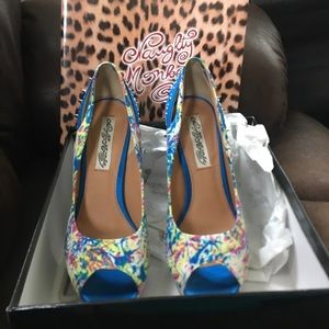 Blue spike heels, never worn
